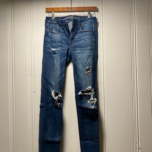American Eagle Womens dark skinny jeans with holes 4X Long